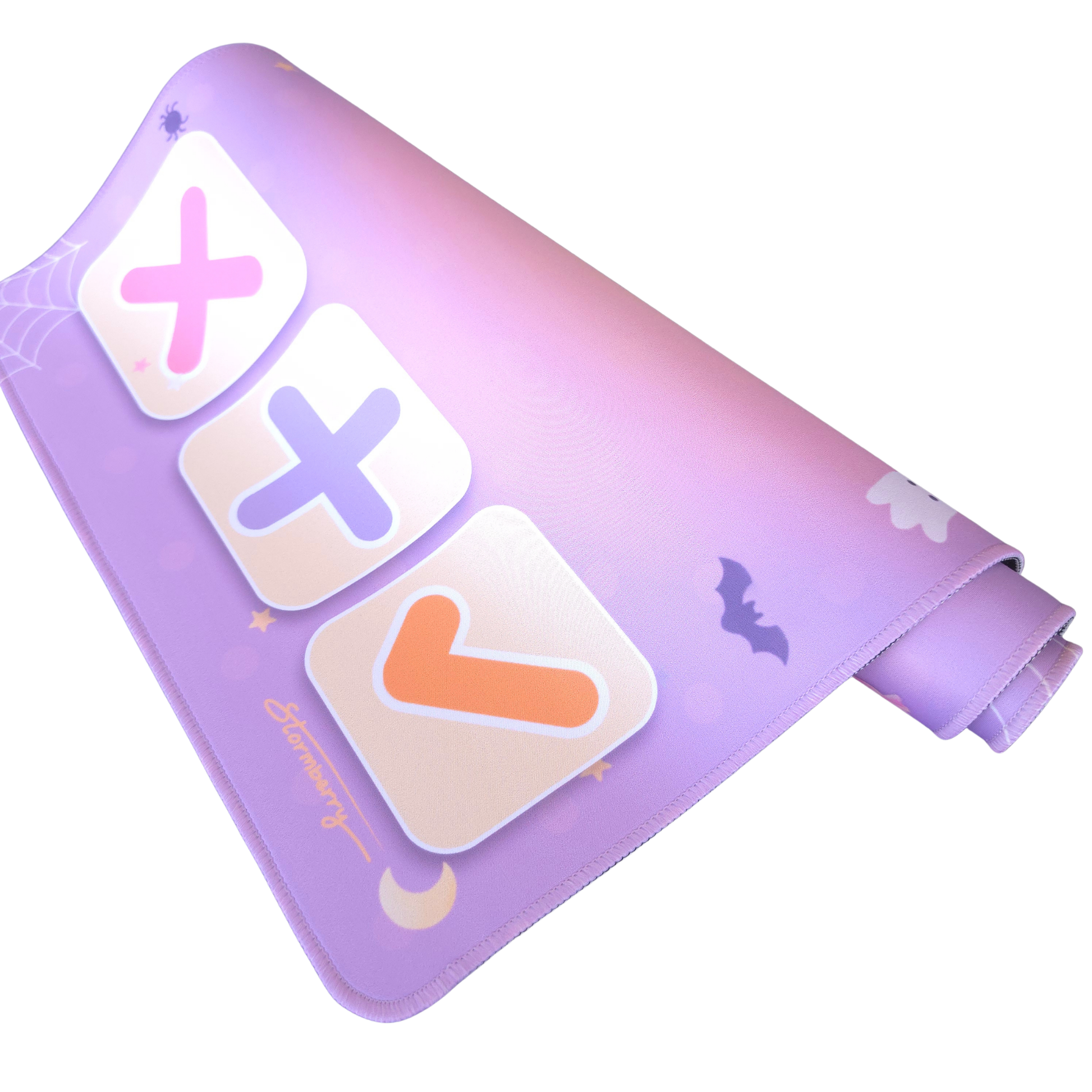 Corner of the XL Pastel Halloween fidget trading mat, showing the soft cloth printed surface