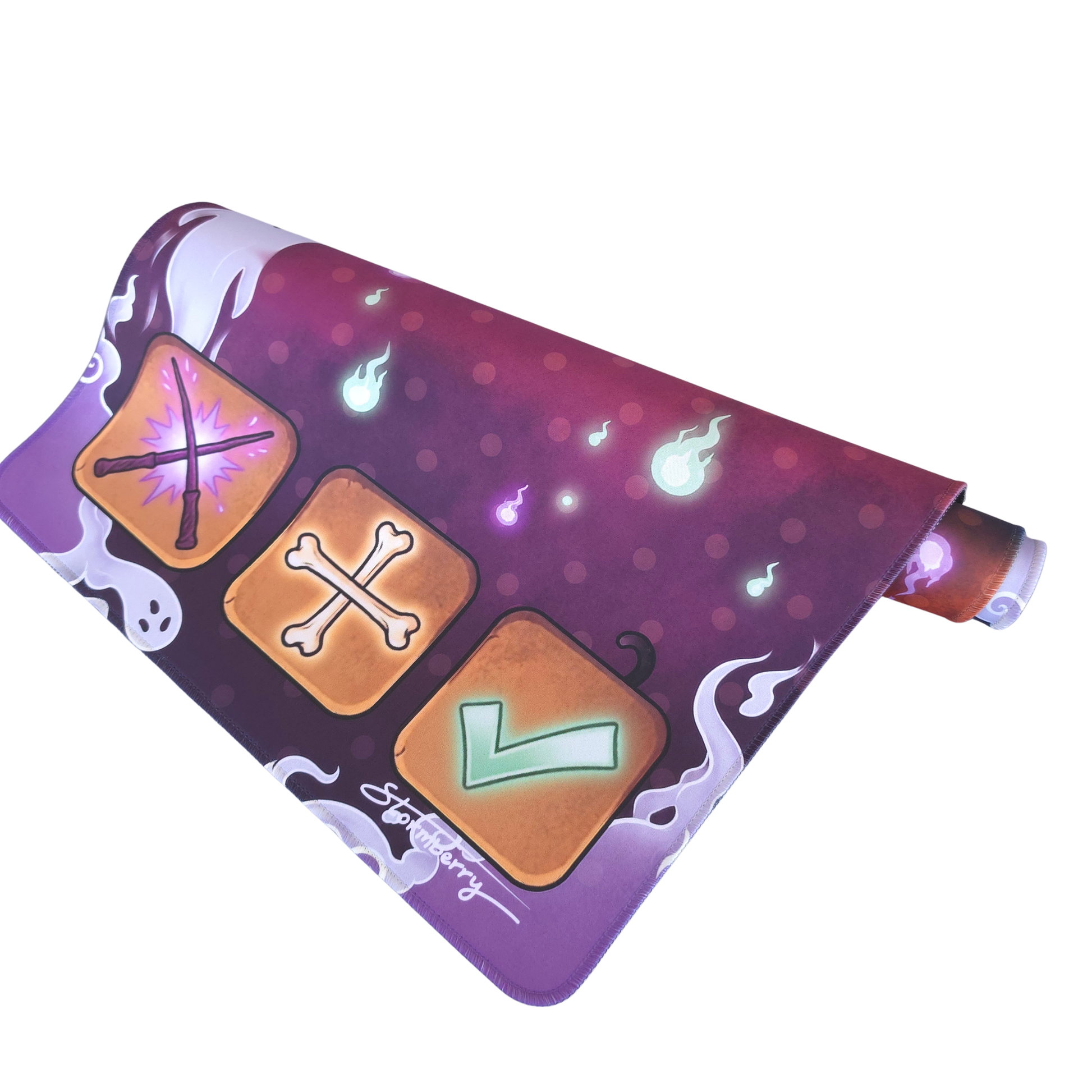 Haunted Hollow XL trade mat rolled up, showing the ghost print and bone tiles