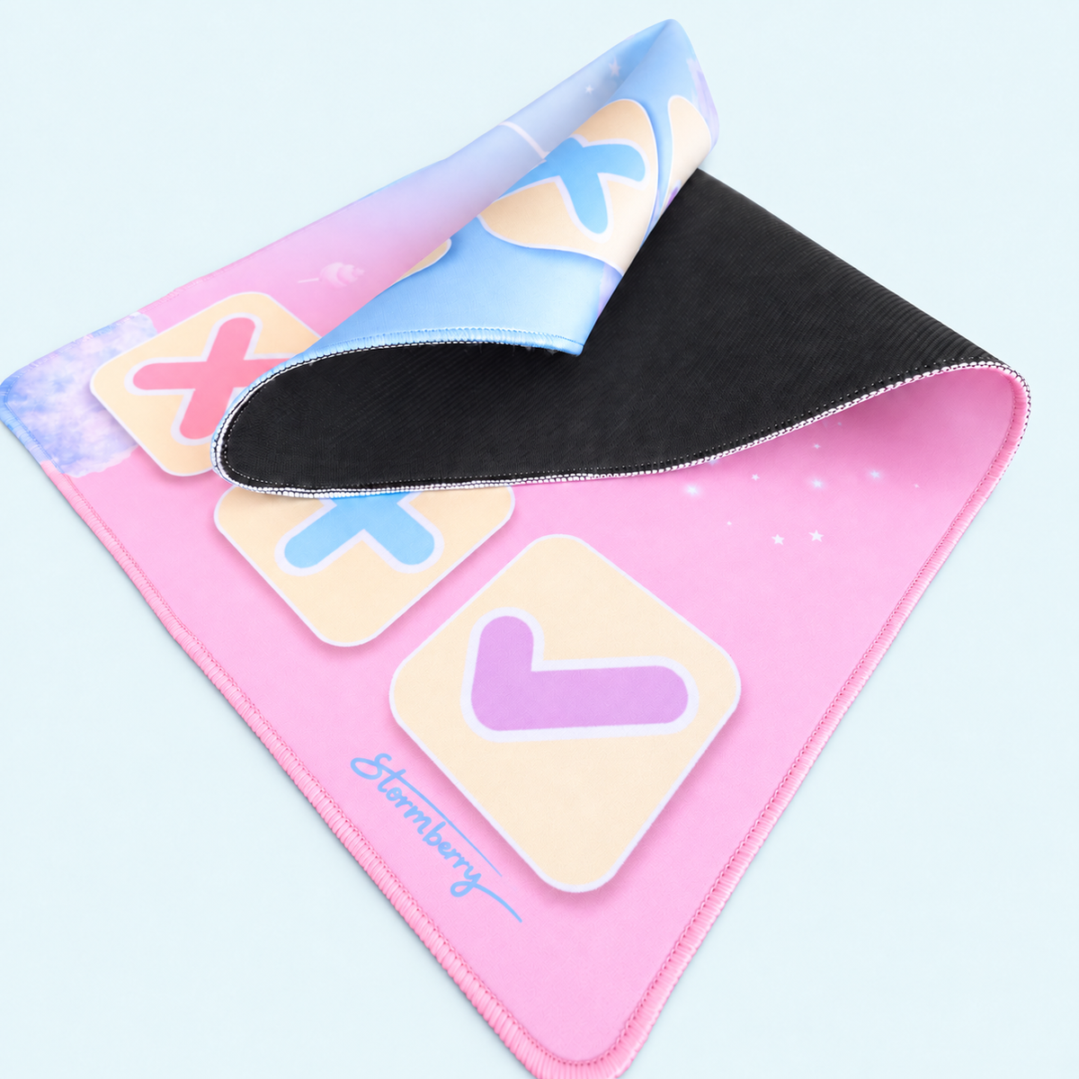 Angled view of Cotton Candy Cloud folded into a curve, showing the black backing, stitching and lavender check symbol.