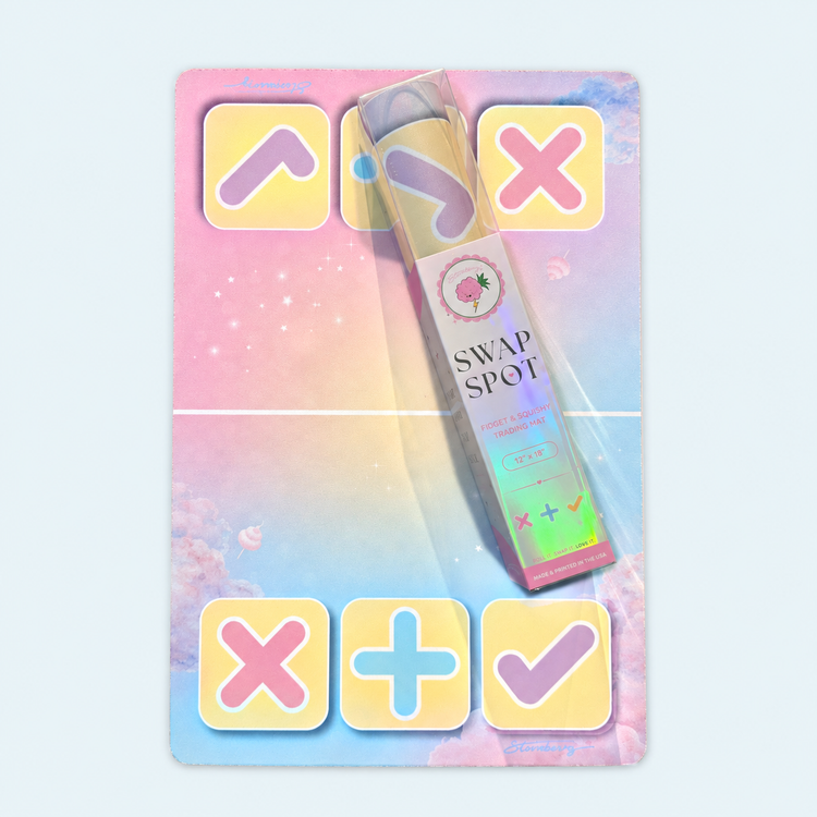 Original 12 x 18 inch Cotton Candy Cloud mat laid flat with a packaged rolled mat across it, showing its pastel pink and blue cloud design.
