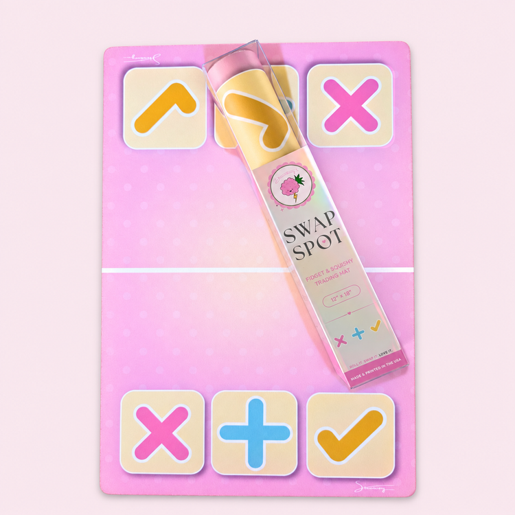 Original 12 x 18 inch Pretty Pink mat laid flat with its clear packaging across it, showing pink X, blue plus and yellow check symbols.